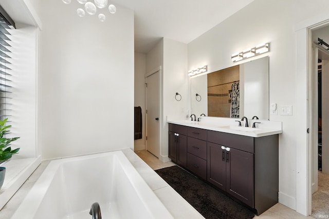 1263 E Legacy Ln, Winona Lake, IN 46590 - bathroom with a garden tub and double vanity