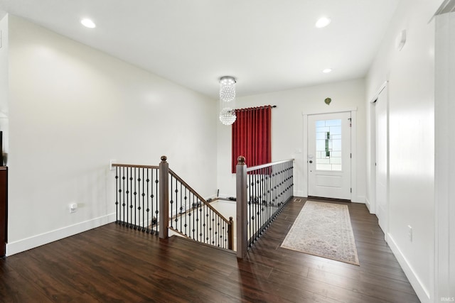 1263 E Legacy Ln, Winona Lake, IN 46590 - entryway with wood finished floors, baseboards, a chandelier, and recessed lighting