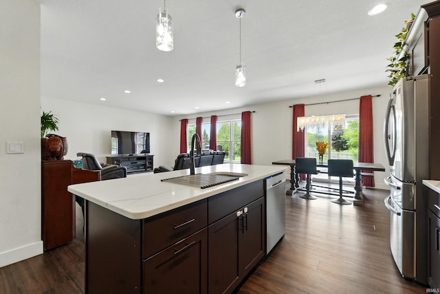 1263 E Legacy Ln, Winona Lake, IN 46590 - kitchen featuring a sink, appliances with stainless steel finishes, hanging light fixtures, recessed lighting, and dark wood-type flooring