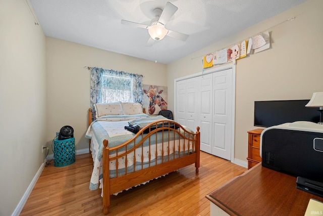 5132 Dunbar Dr, Lafayette, IN 47905 - bedroom featuring light wood finished floors, a closet, baseboards, and a ceiling fan