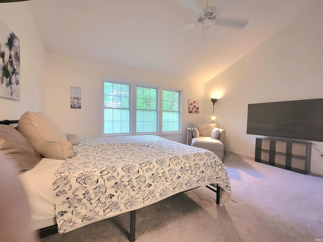 carpeted bedroom with lofted ceiling and a ceiling fan