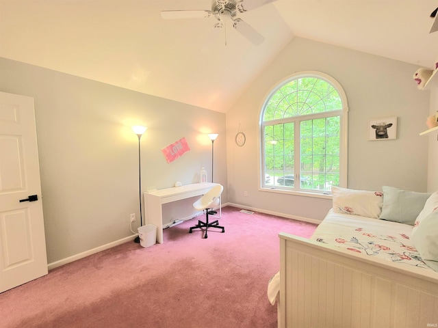 bedroom with vaulted ceiling, carpet, baseboards, and ceiling fan