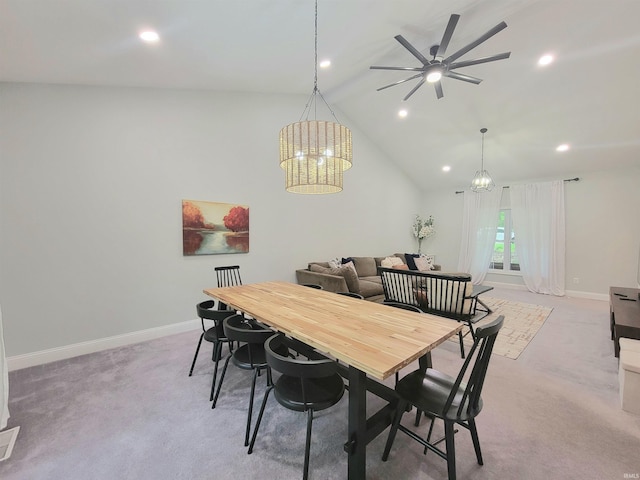 dining space with vaulted ceiling, light carpet, baseboards, recessed lighting, and ceiling fan