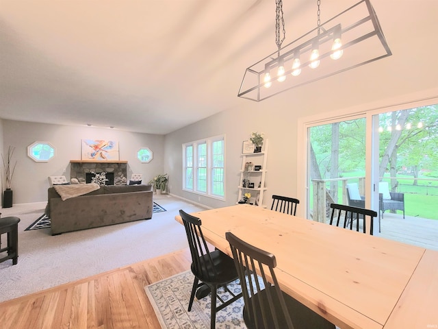 dining area featuring wood finished floors and baseboards