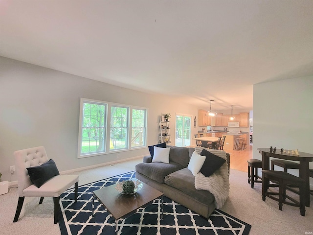 living room with light colored carpet