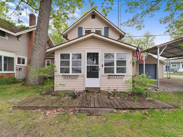 315 Lane 201bb Lake George Ln, Fremont, IN 46737 - back of property featuring a detached carport and a deck