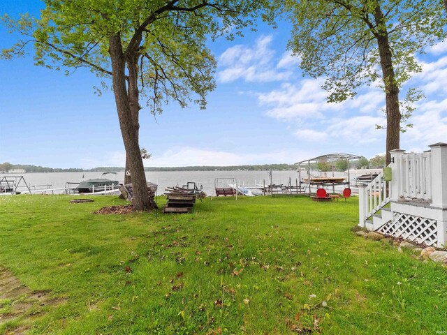 315 Lane 201bb Lake George Ln, Fremont, IN 46737 - view of grassy yard featuring a water view and a boat dock