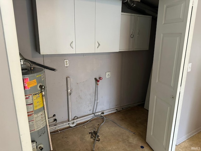 2711 S Villa Dr, Evansville, IN 47714 - laundry area featuring gas water heater and cabinet space