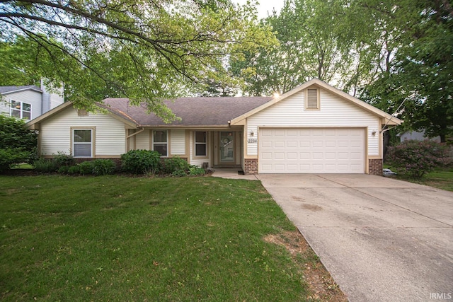 ranch-style house with brick siding, an attached garage, driveway, and a front lawn
