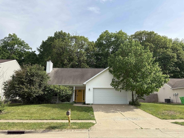 3051 Bluster Ct, West Lafayette, IN 47906 - view of front of property with an attached garage, driveway, a front lawn, and central AC unit