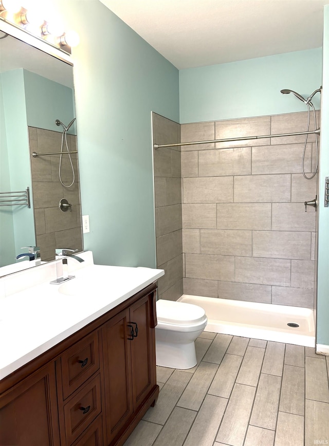 3051 Bluster Ct, West Lafayette, IN 47906 - full bath featuring a stall shower, vanity, toilet, and wood finish floors
