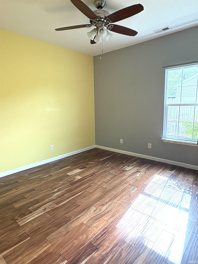 3051 Bluster Ct, West Lafayette, IN 47906 - empty room with dark wood finished floors, ceiling fan, and baseboards