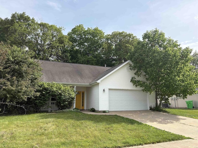 3051 Bluster Ct, West Lafayette, IN 47906 - view of front of house with a garage, concrete driveway, a front yard, and roof with shingles