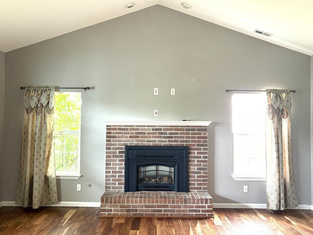 3051 Bluster Ct, West Lafayette, IN 47906 - detailed view of wood finished floors, a brick fireplace, and baseboards