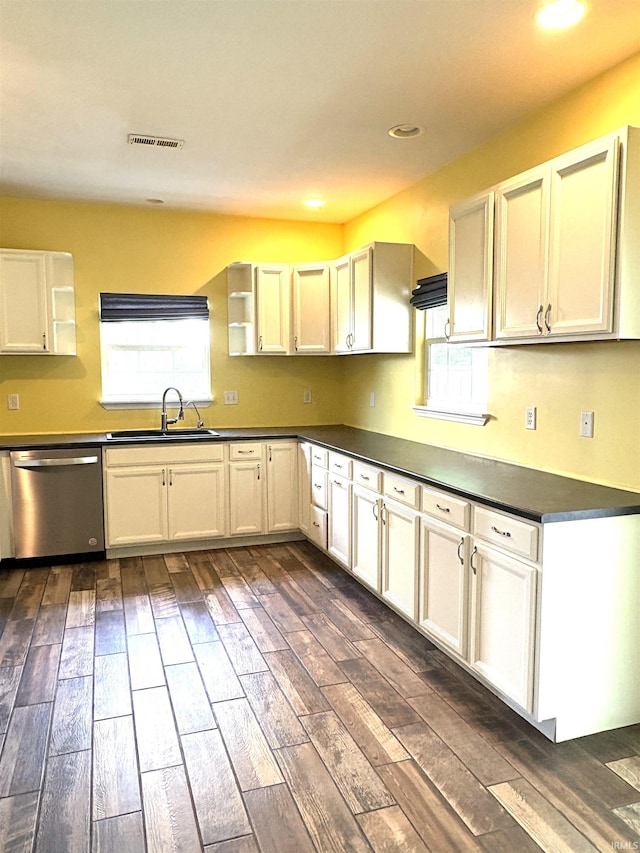 3051 Bluster Ct, West Lafayette, IN 47906 - kitchen with dishwasher, a sink, dark countertops, dark wood-type flooring, and recessed lighting
