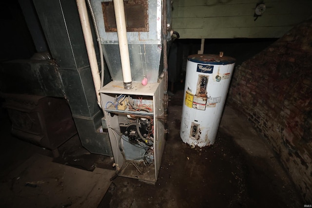 utility room featuring water heater