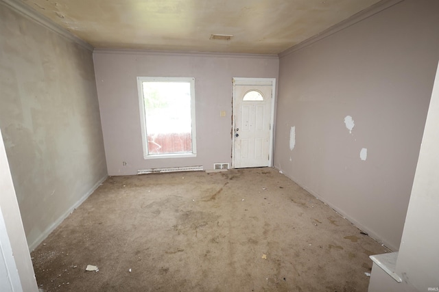 foyer featuring crown molding
