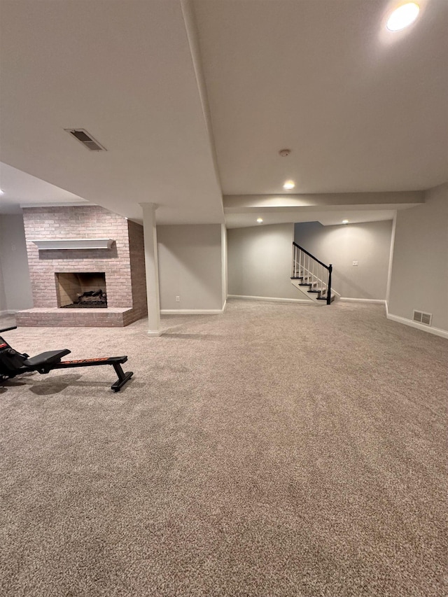 1953 S Troon Rd, Winona Lake, IN 46590 - finished below grade area featuring a brick fireplace, baseboards, stairs, carpet floors, and recessed lighting