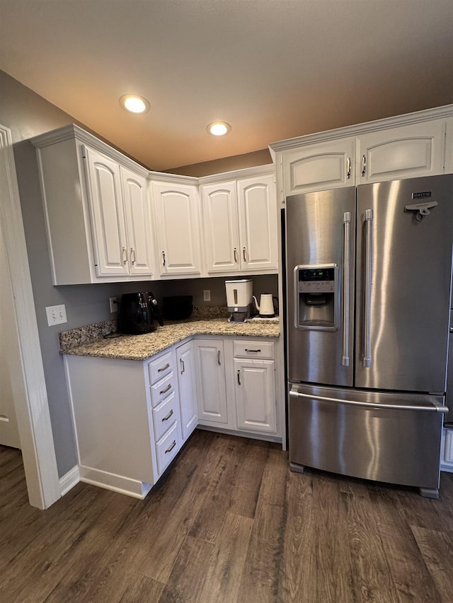 1953 S Troon Rd, Winona Lake, IN 46590 - kitchen with high quality fridge, dark wood-type flooring, white cabinetry, light stone counters, and recessed lighting