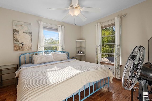 bedroom featuring hardwood / wood-style floors and ceiling fan