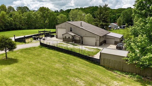11475 Tedrow Ln, Shoals, IN 47581 - back of property with a forest view, an outbuilding, and driveway