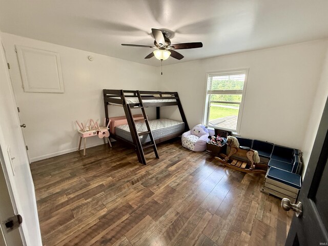 11475 Tedrow Ln, Shoals, IN 47581 - bedroom featuring dark wood-style floors and a ceiling fan