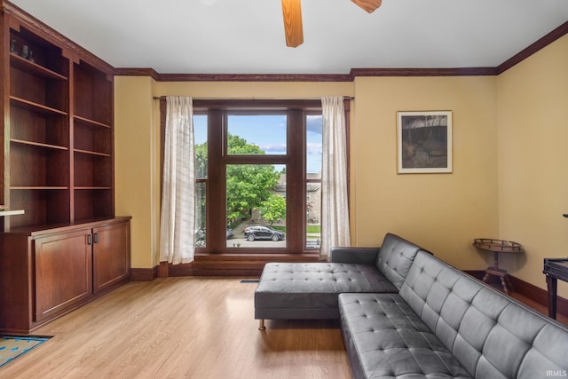511 N 7th St, Lafayette, IN 47901 - living area with baseboards, ceiling fan, light wood-style floors, and ornamental molding