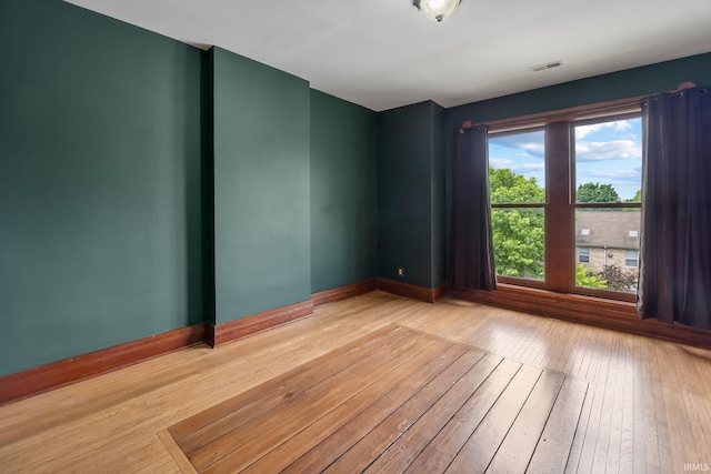 511 N 7th St, Lafayette, IN 47901 - empty room with hardwood / wood-style flooring and baseboards