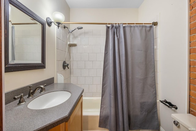 511 N 7th St, Lafayette, IN 47901 - bathroom featuring toilet, shower / bathtub combination with curtain, and vanity