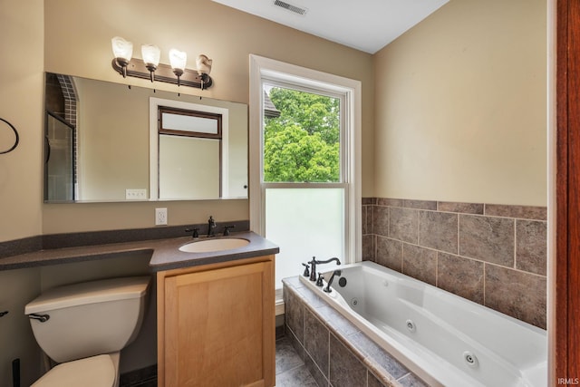 511 N 7th St, Lafayette, IN 47901 - bathroom featuring a jetted tub, toilet, and vanity