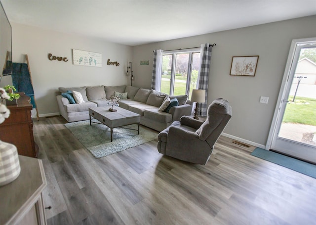 living area with wood finished floors