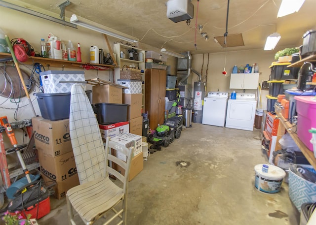 garage featuring separate washer and dryer, a garage door opener, and gas water heater