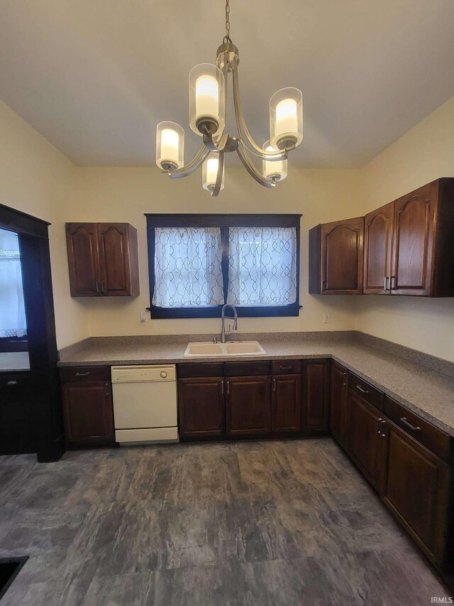 1021 E Blackford Ave, Evansville, IN 47714 - kitchen with a sink, white dishwasher, dark brown cabinetry, and a chandelier