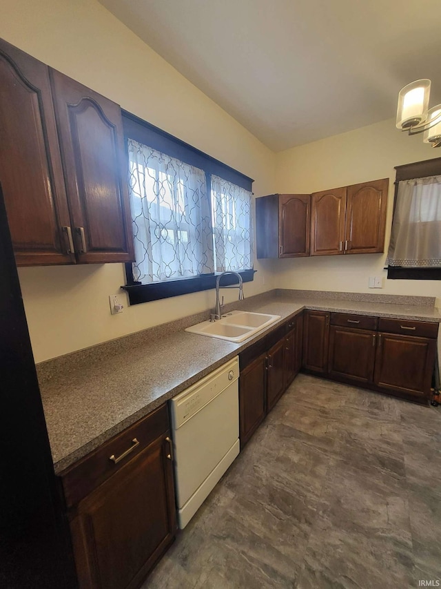 1021 E Blackford Ave, Evansville, IN 47714 - kitchen featuring dishwasher, a sink, and dark brown cabinets