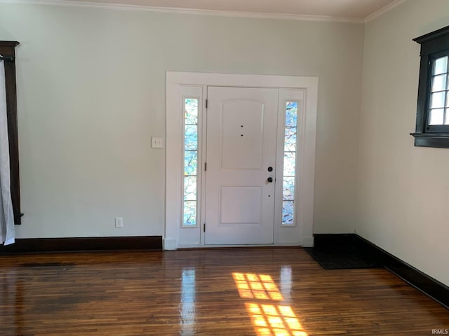 1021 E Blackford Ave, Evansville, IN 47714 - entrance foyer with wood finished floors, crown molding, and baseboards