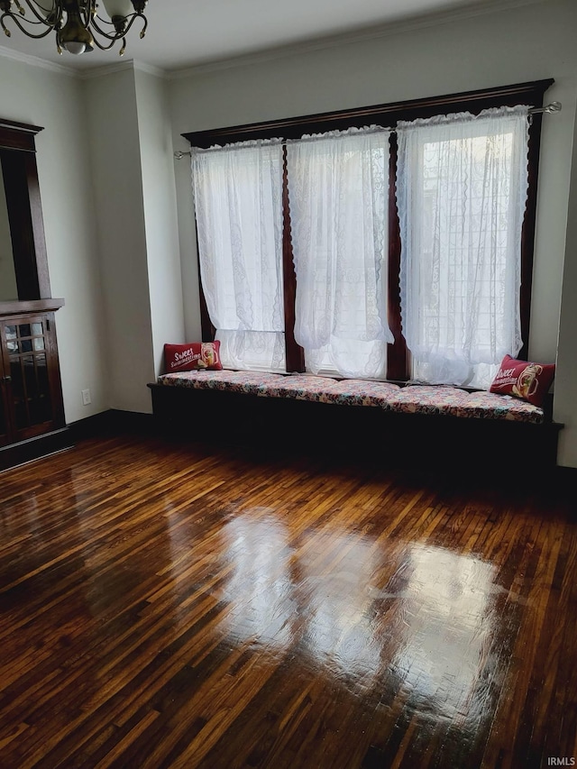 1021 E Blackford Ave, Evansville, IN 47714 - living area featuring a chandelier, hardwood / wood-style floors, and crown molding