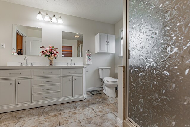 7680 Saint Jordan Cir, Newburgh, IN 47630 - full bathroom with double vanity, a walk in shower, toilet, and baseboards