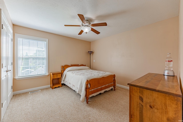 7680 Saint Jordan Cir, Newburgh, IN 47630 - bedroom featuring baseboards, light colored carpet, and ceiling fan