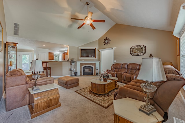7680 Saint Jordan Cir, Newburgh, IN 47630 - living area featuring a ceiling fan, carpet flooring, high vaulted ceiling, and a tile fireplace
