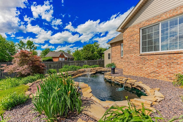 7680 Saint Jordan Cir, Newburgh, IN 47630 - view of swimming pool with a small pond