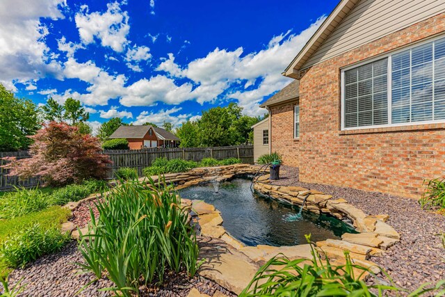 7680 Saint Jordan Cir, Newburgh, IN 47630 - view of swimming pool with a small pond