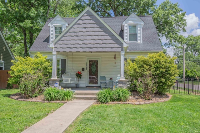 1304 Parkside Dr, Evansville, IN 47714 - cape cod-style house with a porch and a shingled roof
