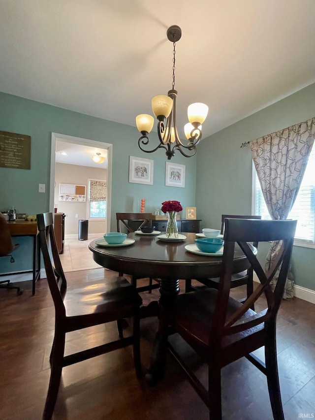 1304 Parkside Dr, Evansville, IN 47714 - dining space with a chandelier, baseboards, and an office area