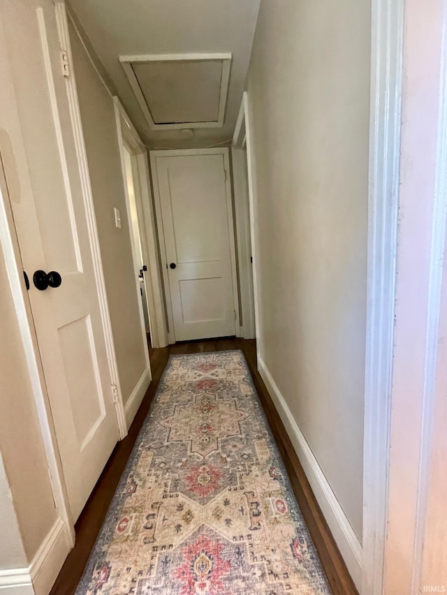 1304 Parkside Dr, Evansville, IN 47714 - corridor with attic access, baseboards, and wood finished floors