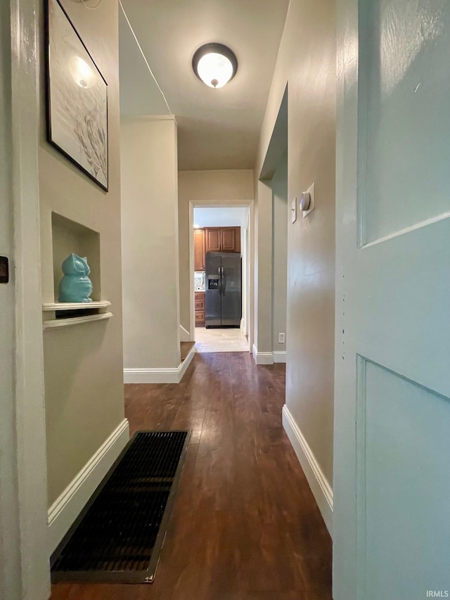 1304 Parkside Dr, Evansville, IN 47714 - hall featuring dark wood-type flooring and baseboards
