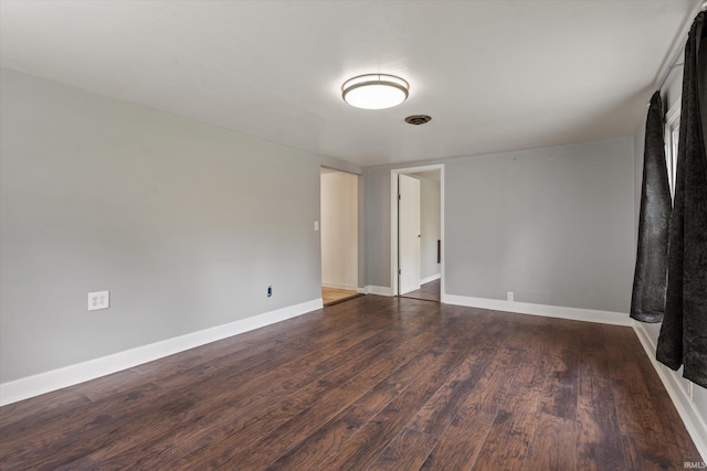 114 S Grand St, Lakeville, IN 46536 - spare room with wood finished floors and baseboards