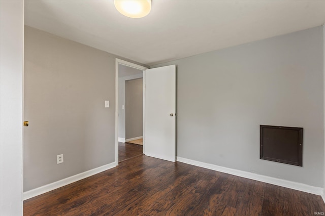 114 S Grand St, Lakeville, IN 46536 - spare room with wood finished floors and baseboards