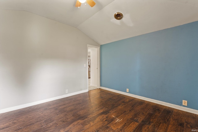 114 S Grand St, Lakeville, IN 46536 - empty room featuring ceiling fan, vaulted ceiling, wood finished floors, and baseboards