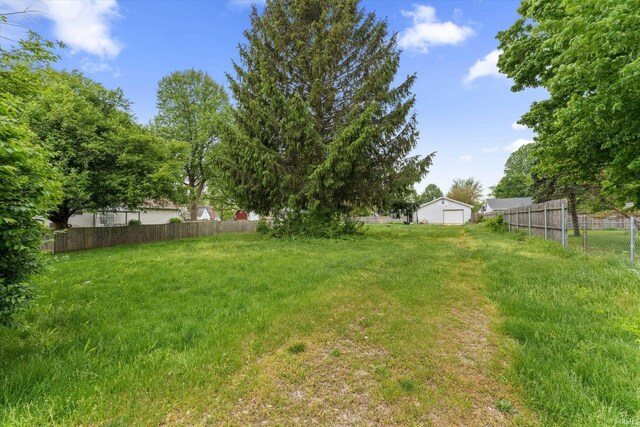 114 S Grand St, Lakeville, IN 46536 - view of yard featuring fence