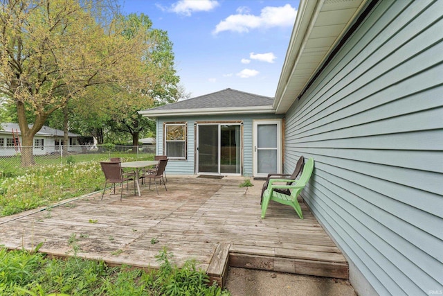 114 S Grand St, Lakeville, IN 46536 - wooden deck with outdoor dining area and fence